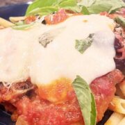 Prepared grilled chicken Parmesan.