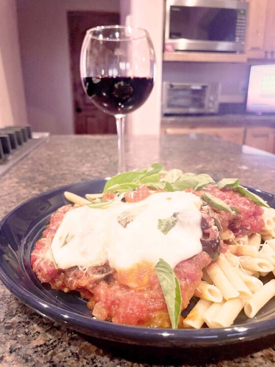 Prepared chicken marinara with wine.