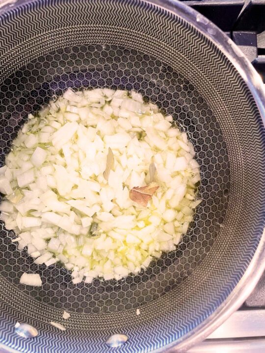 Chopped onions, to prep for homemade marinara sauce.