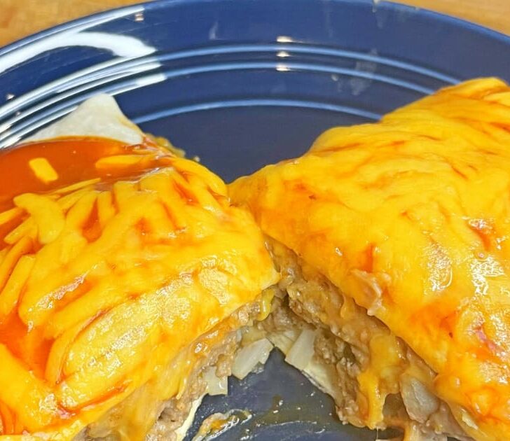 Overhead view of Taco Bell enchirito recipe prepared on plate.