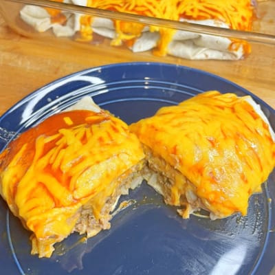 Overhead view of Taco Bell enchirito recipe prepared on plate.