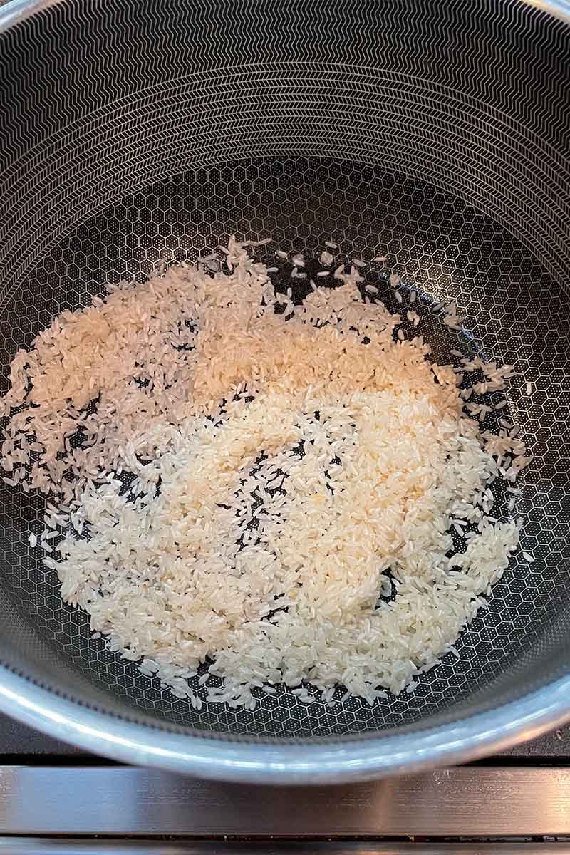 Rice sauteed in melted butter.