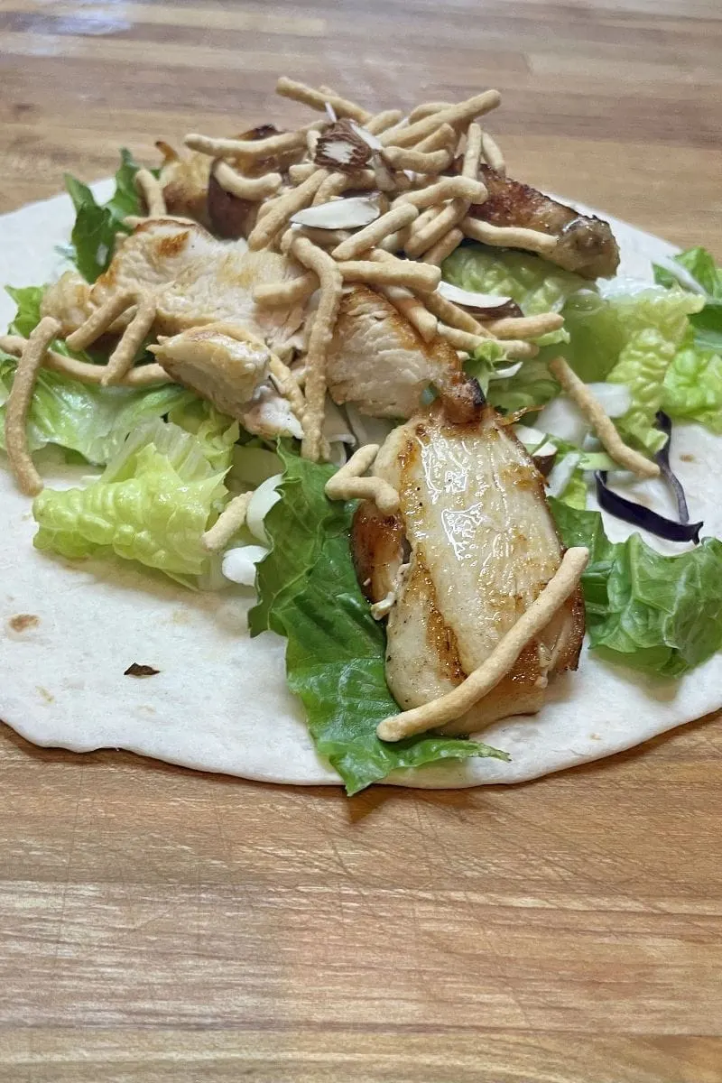 Applebees Oriental Chicken Rollup recipe, with filling on tortilla.