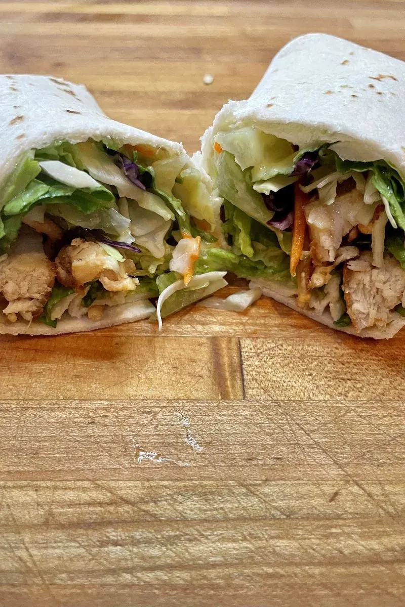 Applebee's oriental chicken roll up recipe, prepared on cutting board.