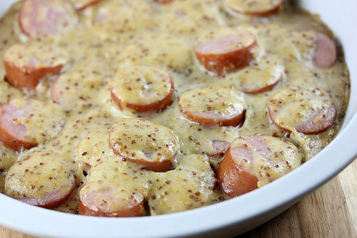 Baked sausage slices in maple mustard sauce
