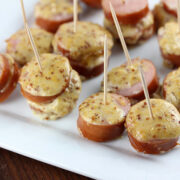 Baked sausage slices in maple mustard sauce