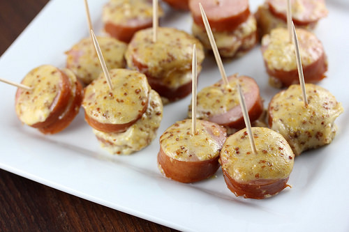 Baked sausage slices in maple mustard sauce