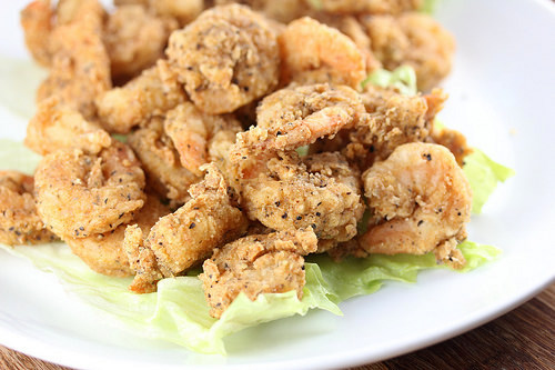 Popeyes popcorn shrimp served on a bed of lettuce