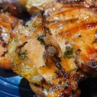 Close up of grilled cilantro lime chicken thighs.