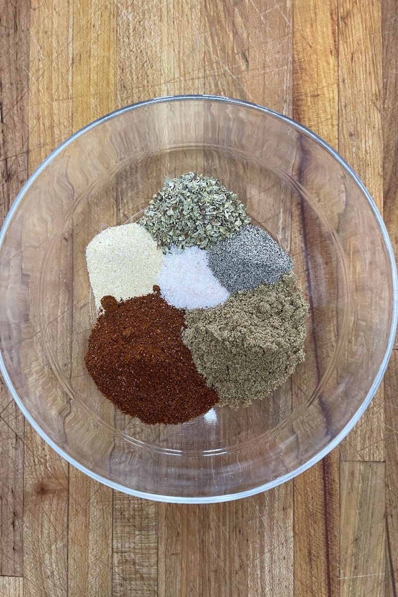 Seasonings for Doritos chicken nachos in a bowl. 