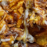 Doritos chicken nachos, prepared on a plate.