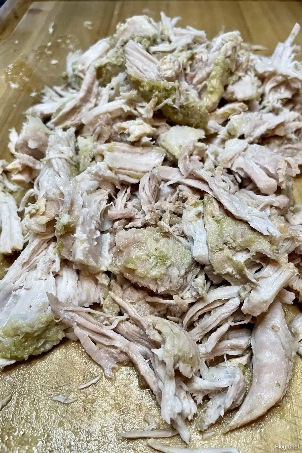 Shredded pork for pork verde tacos.