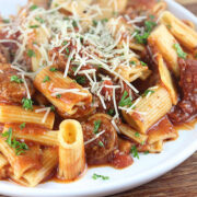 Italian Sausage Rigatoni on plate with parmesan