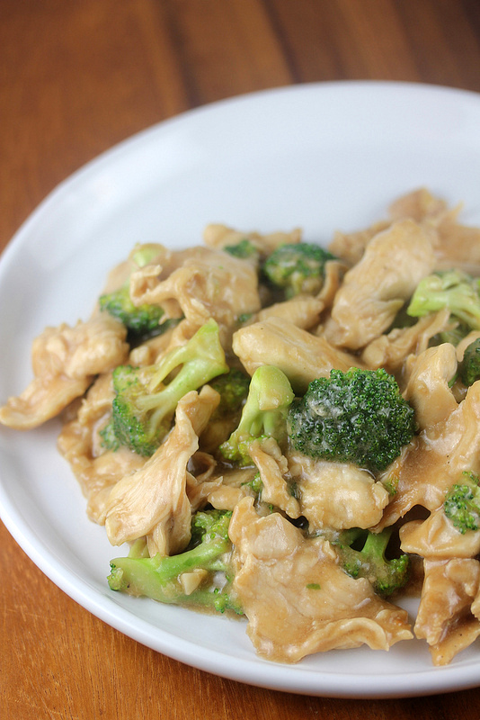 Chinese buffet broccoli chicken with savory sauce served in a white bowl