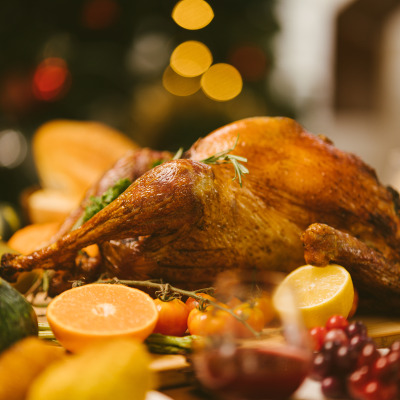 Roasted turkey on serving platter.