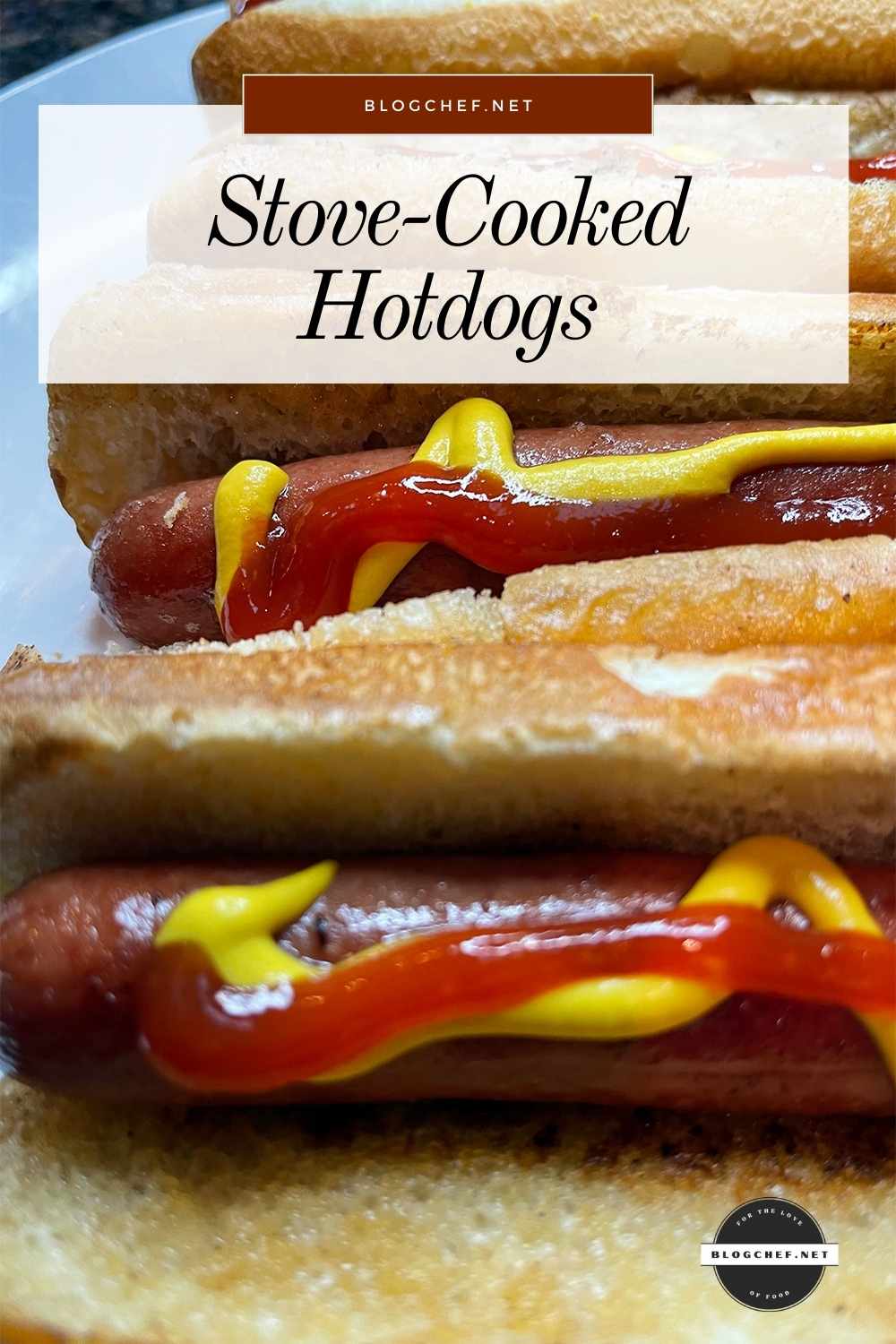 Stovetop hotdogs in buns with ketchup and mustard.