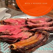 Close up view of prime rib reverse sear, served on platter.