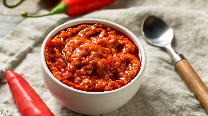 Close up of homemade Calabrian chili paste.