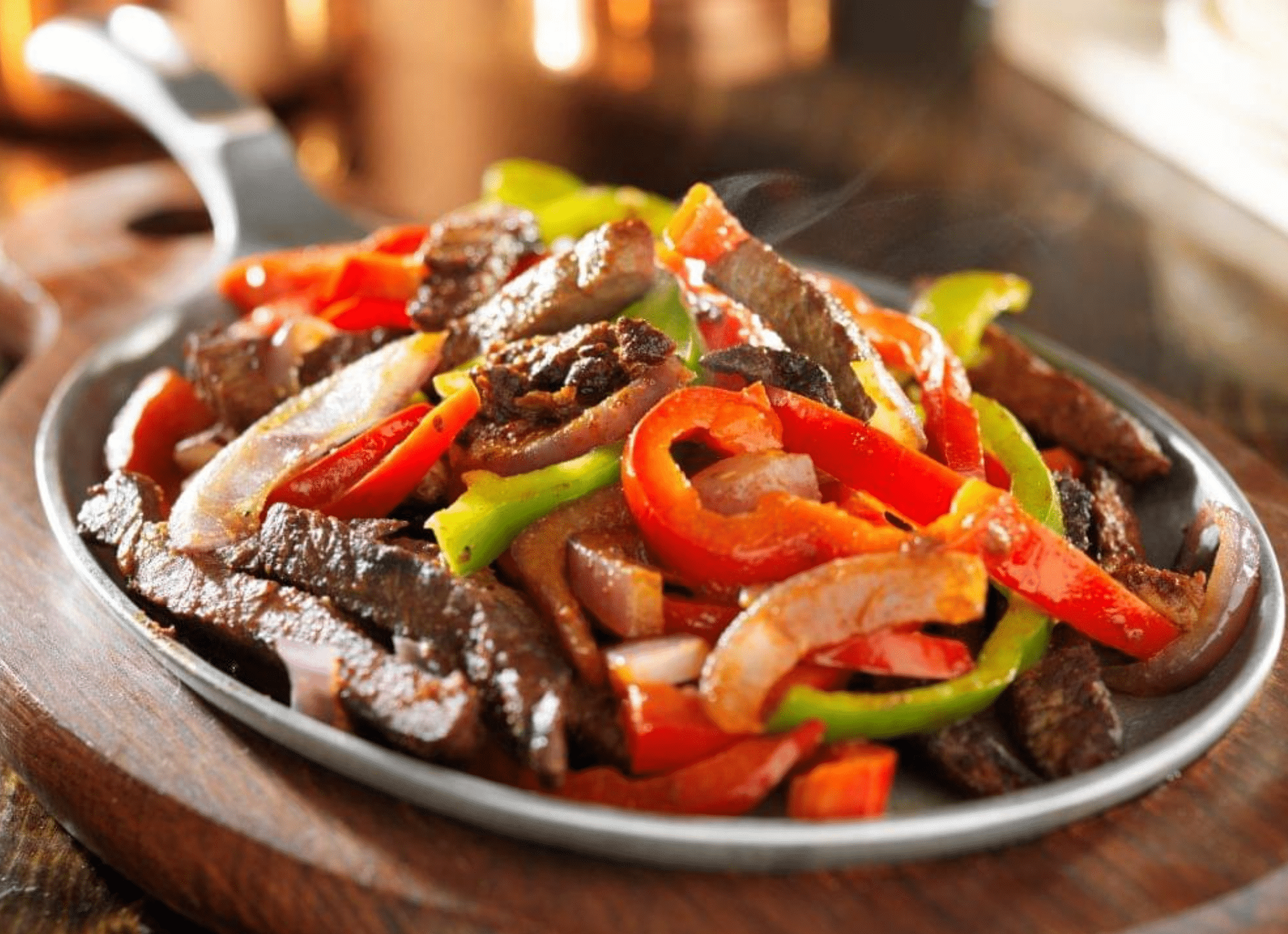 Beef fajitas with onions and bell peppers
