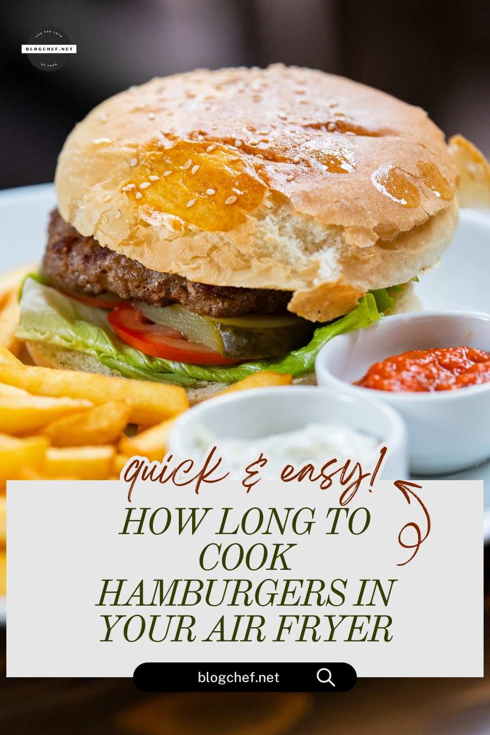 prepared hamburger on plate with fries and sauces