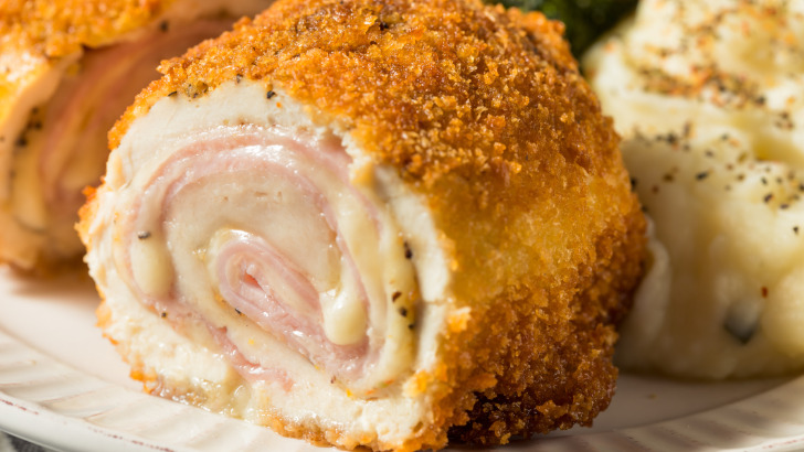 Close up view of prepared chicken cordon bleu.