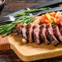 Sliced sirloin steak, prepared in an air fryer.