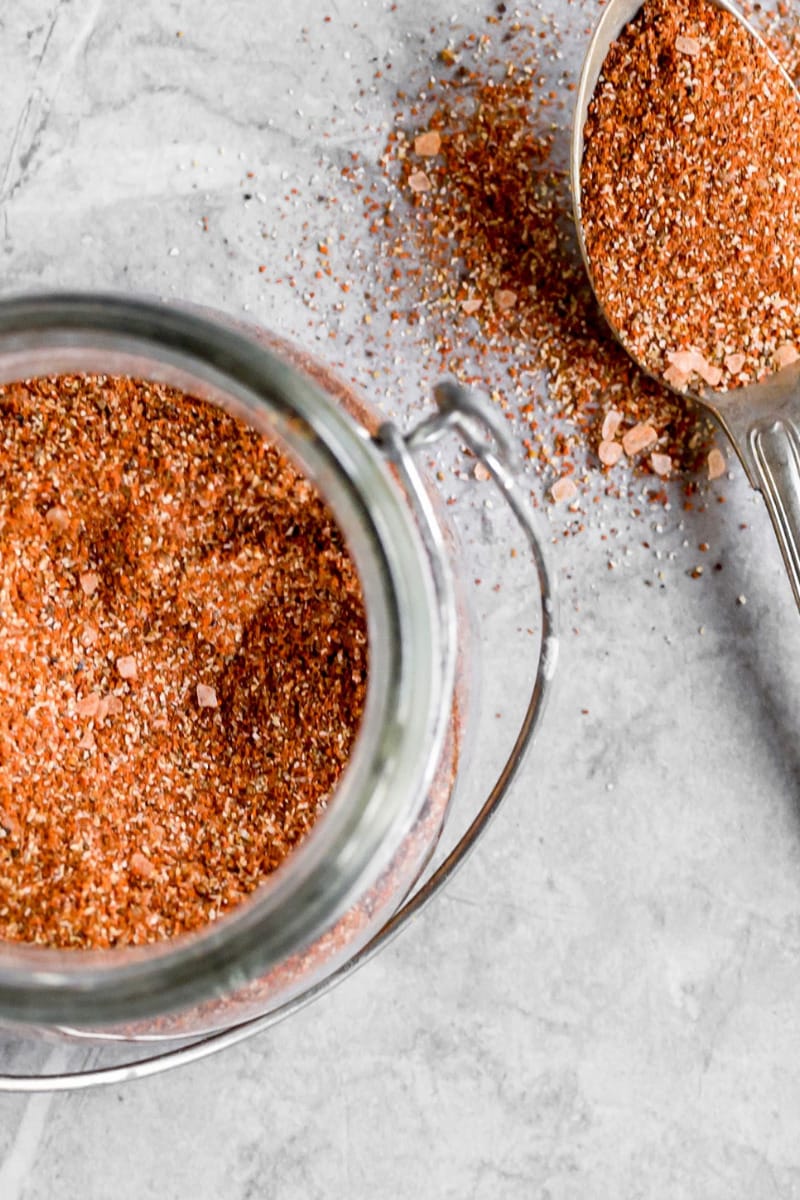 Overhead view of jerk seasoning in a container. 