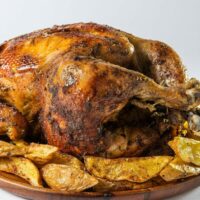 Whole chicken, prepared in air fryer.