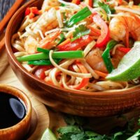 Prepared pad Thai in a bowl.