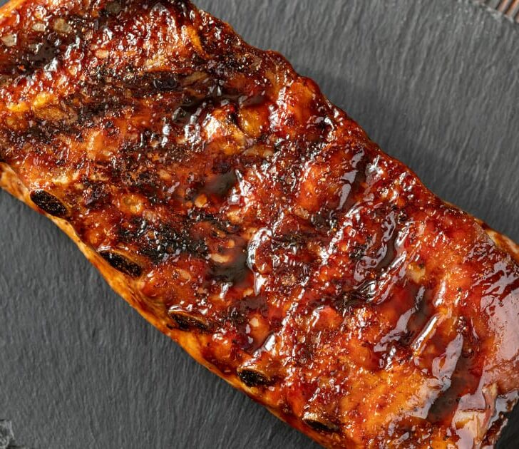 Overhead view of oven-baked ribs.