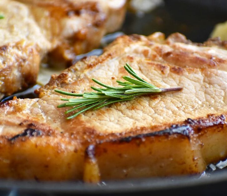 1-inch pork chops prepared on plate.