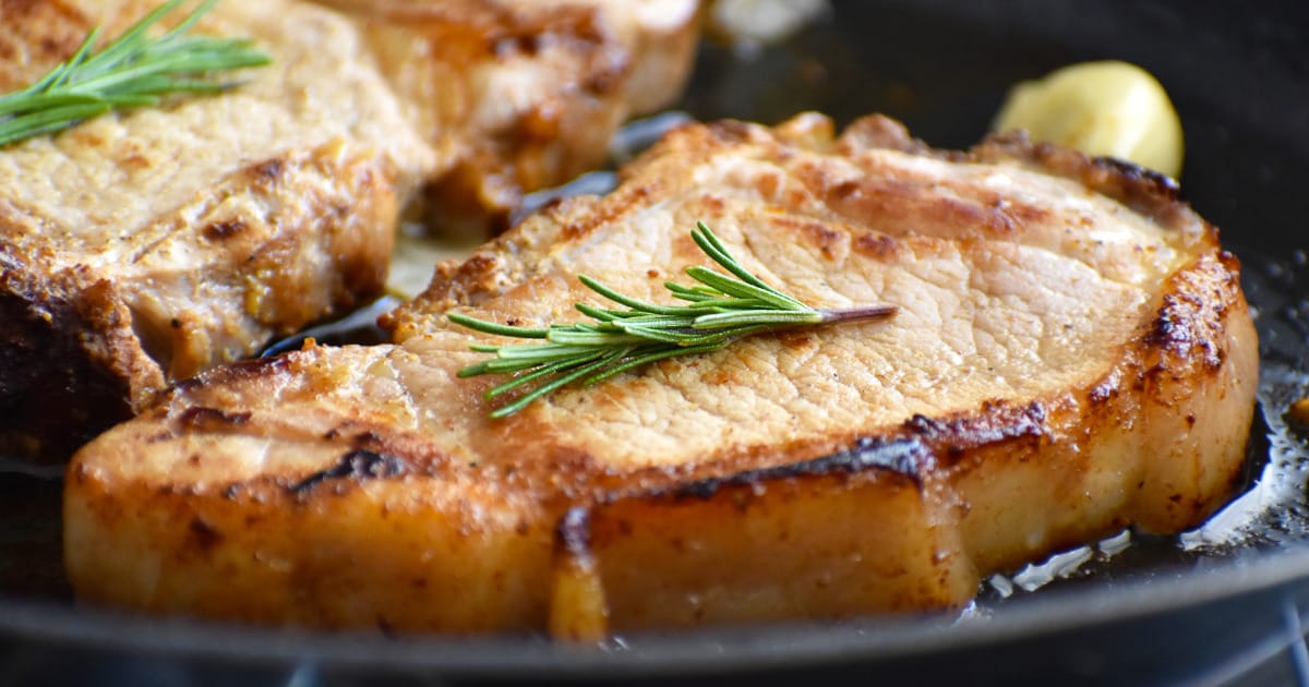 1-inch pork chops prepared on plate.