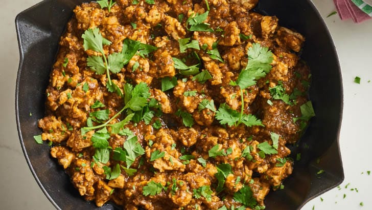 Top view of sofrita in a skillet.