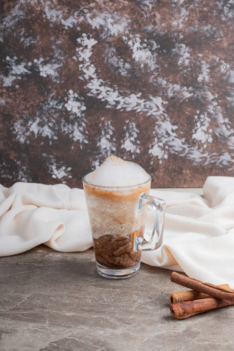 Cinnamon dolce in glass mug. 