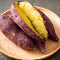 Baked sweet potatoes on plate.