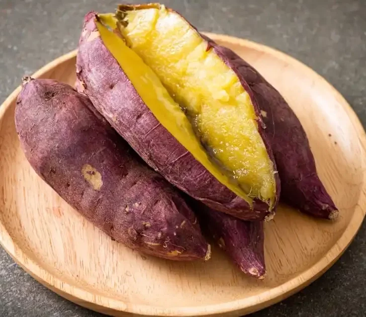 Baked sweet potatoes on plate.