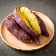 Baked sweet potatoes on plate.