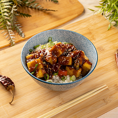 Spicy tofu stir fry in a bowl.