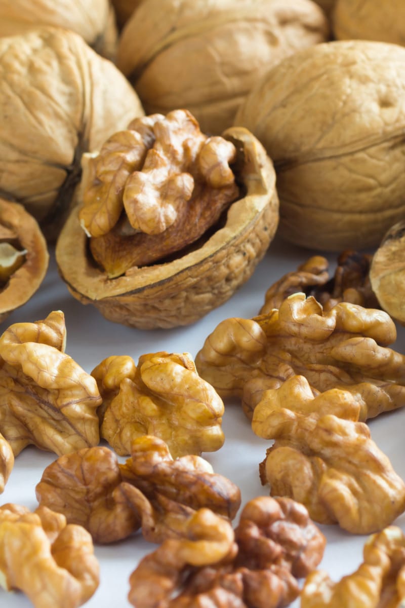 Walnut halves on a table.