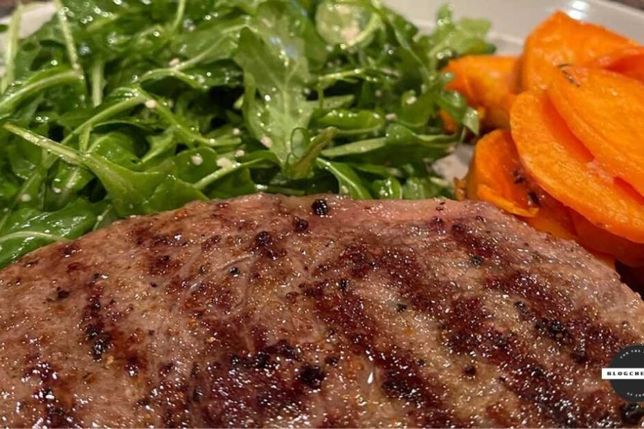 Reverse-sear steak served with arugula salad and carrots.