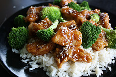 Chicken and broccoli on rice, topped with sesame seeds