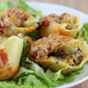 Close-up of cheesy fajita stuffed shells with beef and peppers
