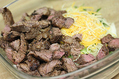 Cooked steak and cheese for fajita stuffed shells filling