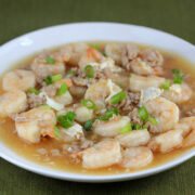 Shrimp with lobster sauce served on a white plate