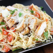 Grilled chicken bruschetta pasta with tomatoes and parmesan