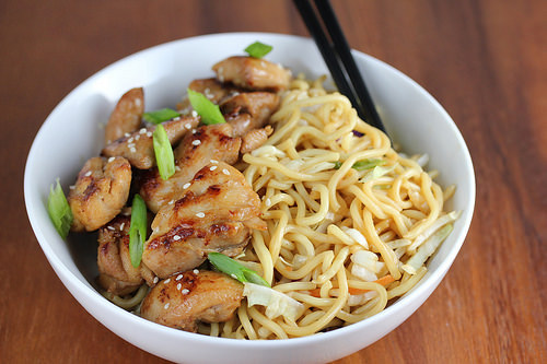 Chicken noodles in a bowl with scallions