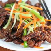 Plate of crispy Sichuan beef with vegetables