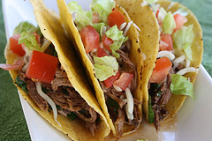 Hard shell tacos with beef and lettuce