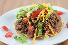 Beef tostada with toppings