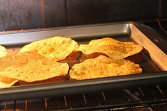 Crispy tostadas baking in oven